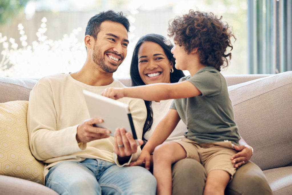 a-boy-with-his-parents-using-tablet-ethnography